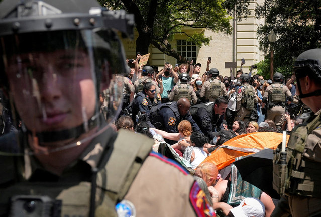 Police arrest a pro-Palestinian protester, during the ongoing conflict between Israel and the Palestinian Islamist group Hamas, at the University of Texas in Austin, Texas, U.S. April 29, 2024. (Photo by Jay Janner/American-Statesman/USA Today Network via Reuters)
