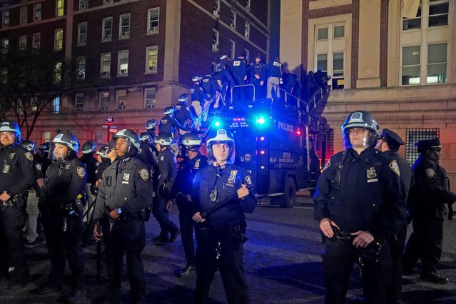 Police use a special vehicle to enter Hamilton Hall which protesters occupied, as other officers enter the campus of Columbia University, in New York City on April 30, 2024. (Photo by David Dee Delgado/Reuters)