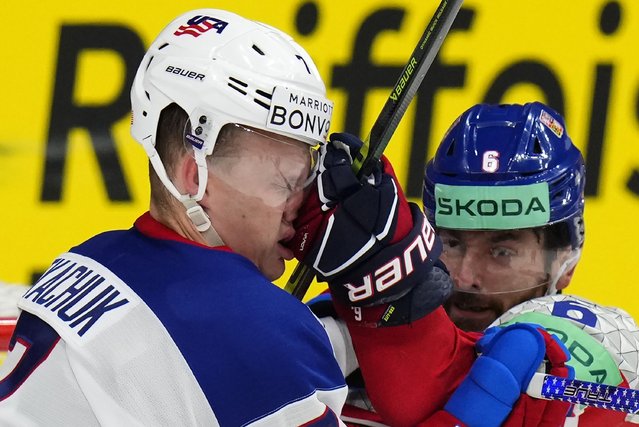 Czech Republic's Michal Kempny, right, punches United States' Brady Tkachuk during the quarterfinal match between Czech Republic and United States at the Ice Hockey World Championships in Prague, Czech Republic, Thursday, May 23, 2024. (Photo by Petr David Josek/AP Photo)