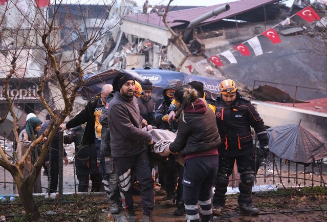 24-year-old Rumeysa Yalcinkaya is rescued under rubble of collapsed building after 27 hours of 7.7 magnitude earthquake in Kahramanmaras, Turkiye on February 07, 2023. Early Monday morning, a strong 7.7 earthquake, centered in the Pazarcik district, jolted Kahramanmaras and strongly shook several provinces, including Gaziantep, Sanliurfa, Diyarbakir, Adana, Adiyaman, Malatya, Osmaniye, Hatay, and Kilis. Later, at 13.24 p.m. (1024GMT), a 7.6 magnitude quake centered in Kahramanmaras' Elbistan district struck the region. Turkiye declared 7 days of national mourning after deadly earthquakes in southern provinces. (Photo by  Emin Sansar/Anadolu Agency)