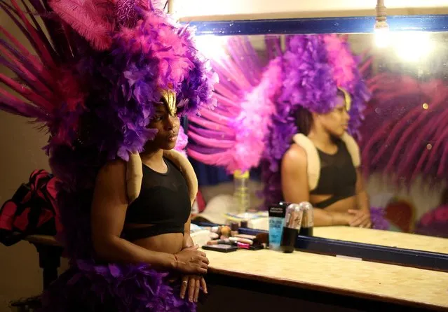 Acrobat Indira Avila looks on in her dressing room ahead of a dress rehearsal at the newly renovated Blackpool Tower Circus in Blackpool, Britain, March 28, 2022. (Photo by Phil Noble/Reuters)