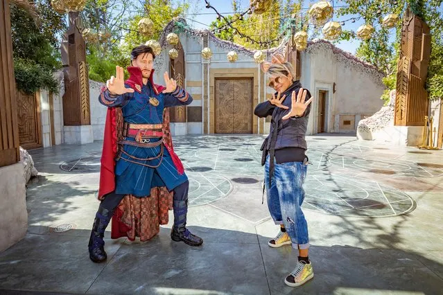 In this handout photo provided by Disneyland Resort, American actress Halle Berry poses with Doctor Strange during a visit to Avengers Campus in Disney's California Adventure inside Disneyland on March 30, 2022 in Anaheim, California. (Photo by Christian Thompson/Disneyland Resort via Getty Images)