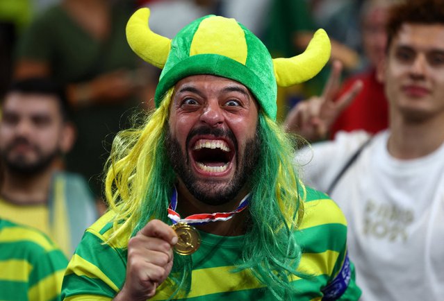 A spectator reacts after a Brazil Volleyball win during Paris 2024 Olympics in Women's Preliminary Round, Pool B Brazil vs Poland at South Paris Arena 1 in Paris, France on August 04, 2024. (Photo by Siphiwe Sibeko/Reuters)