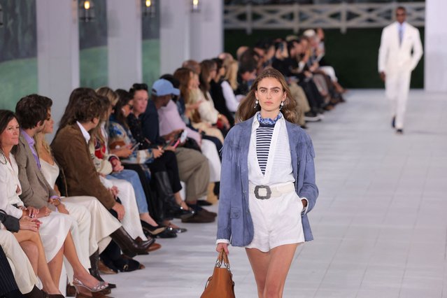 A model presents a creation from the Ralph Lauren Spring/Summer 2025 collection in Bridgehampton, New York, U.S., September 5, 2024. (Photo by Andrew Kelly/Reuters)