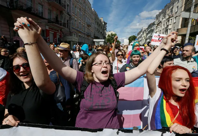 People take part in the March of Equality, organized by LGBT and human rights activists in Kiev, Ukraine, June 12, 2016. (Photo by Valentyn Ogirenko/Reuters)