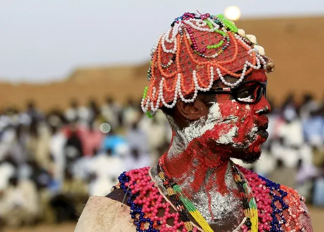 A wrestler from the Nuba Mountains tribe participates in a celebration of their cultural heritage, as part of ongoing events to commemorate the International Day of the World's Indigenous Peoples, in Omdurman August 15, 2015. (Photo by Mohamed Nureldin Abdallah/Reuters)