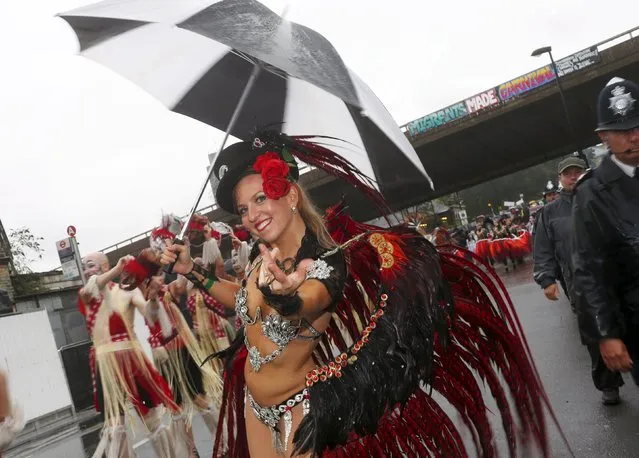 A performer poses for a photograph at the Notting Hill Carnival in west London, August 31, 2015. (Photo by Eddie Keogh/Reuters)