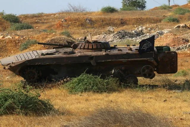 An armoured vehicle belonging to rebel fighters is pictured in an artillery academy of Aleppo, Syria August 6, 2016. (Photo by Ammar Abdullah/Reuters)