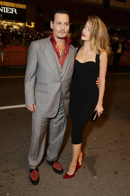 Johnny Depp and Amber Heard seen at  Warner Bros. “Black Mass” Premiere at 2015 Toronto International Film Festival on Monday, September 14, 2015, in Toronto, CAN. (Photo by Eric Charbonneau/Invision for Warner Bros./AP Images)