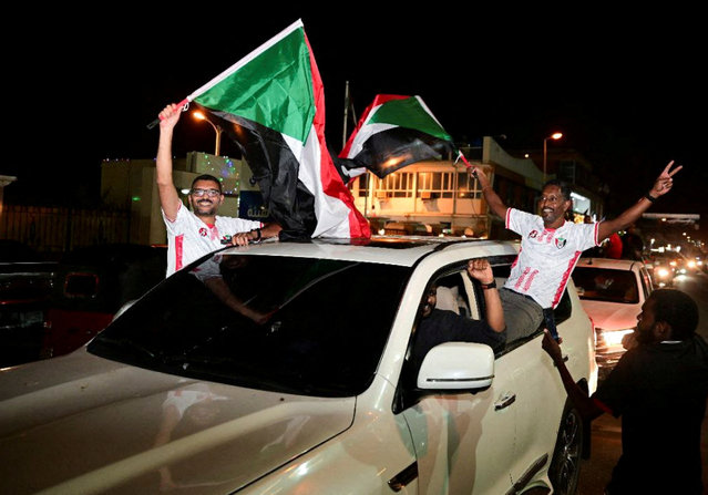 Sudanese citizens celebrate on a street after the Sudanese army deepened its control over the capital Khartoum, from the Rapid Support Forces (RSF), in Port Sudan, Sudan on March 27, 2025. (Photo by Ibrahim Mohammed Ishak/Reuters)