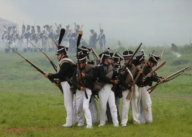 Participants in the Borodino Battle re-enactment during the show at the Borodino Field in the Moscow Region on September 4, 2016. (Photo by Kirill Kallinikov/Sputnik)