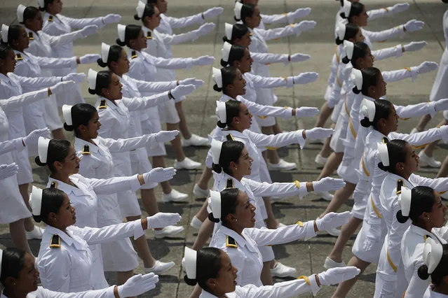 Military nurses march during a graduation ceremony at the Military Academy in Mexico City, Tuesday, September 13, 2016. (Photo by Rebecca Blackwell/AP Photo)