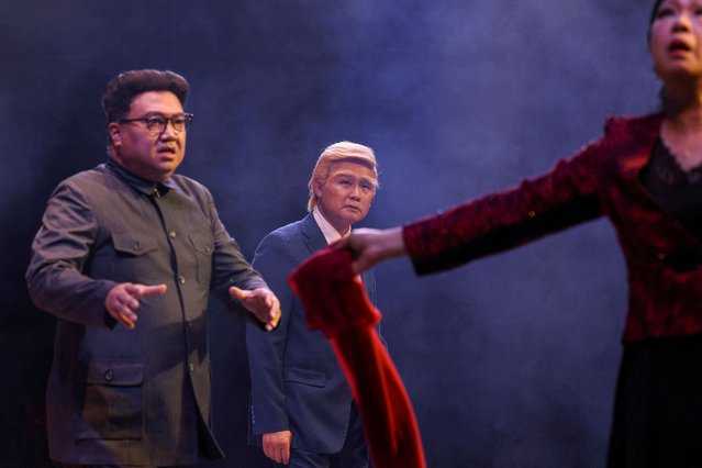 Cantonese opera actor Lung Koon-tin, portraying U.S. President Donald Trump, performs on stage with another actor playing North Korean leader Kim Jong Un in “Trump, The Twins President” in Hong Kong, China, on June 5, 2025. (Photo by Tyrone Siu/Reuters)