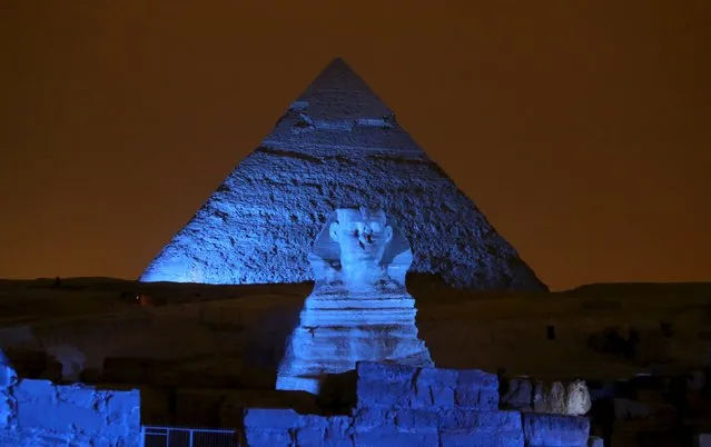 The Great Pyramids and Sphinx reflect blue light during a celebration for the 70th anniversary of the United Nations in Giza, Egypt, October 24, 2015. (Photo by Mohamed Abd El Ghany/Reuters)