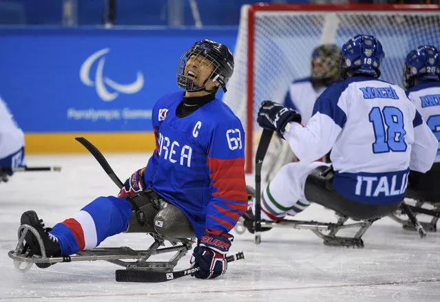 Min Su Han of South Korea reacts after missing a shot against Italy during the Ice Hockey Bronze Medal Game between the South Korea and Italy at the Gangneung Hockey Centre  in Gangneung, South Korea at the 2018 Winter Paralympics Saturday, March 17, 2018. (Photo by Joel Marklund/OIS/IOC via AP Photo)
