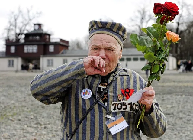 87-year-old Nazi concentration camp survivor Petro Mischtschuk, from Ukraine, reacts during the commemoration ceremonies for the 68th anniversary of the liberation of the Buchenwald concentration camp near Weimar, Germany, on April 14, 2013. (Photo by Jens Meyer/Associated Press)