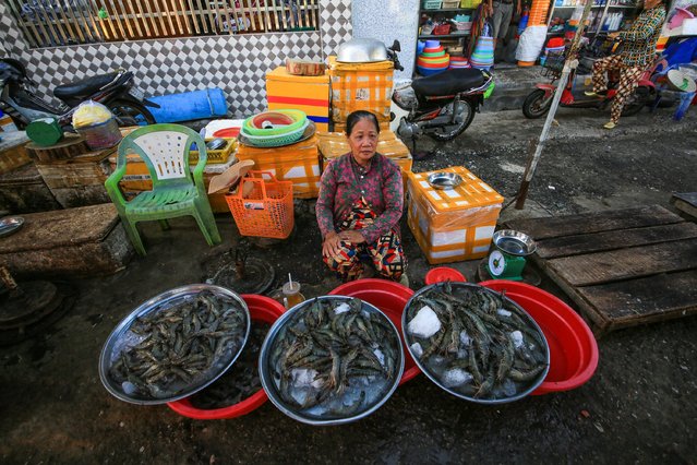 A view from Nai Market (Du Khanh Market) stands out as the region's largest fishing village and seafood market in Khanh Hai town of Vietnam's Ninh Thuan province on July 08, 2025. From early morning, fresh catches brought in by fishing boats fill the market, where women both sell and dry seafood. After trading ends, villagers spend time playing traditional games. (Photo by Ummu Nisan Kandilcioglu/Anadolu via Getty Images)