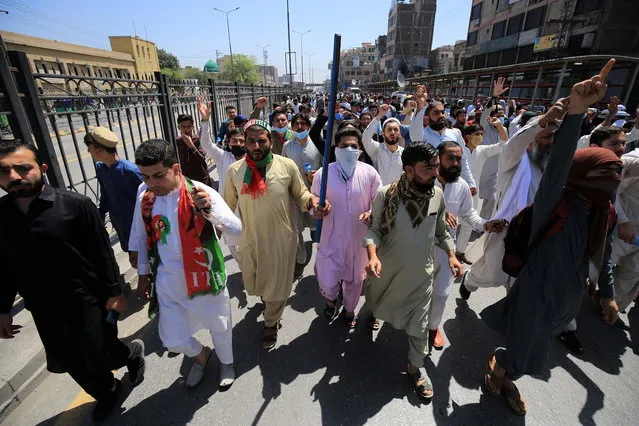 Supporters of Pakistan's former Prime Minister Imran Khan rally following the arrest of the head of the opposition party Pakistan Tehrik-e-Insaf, in Peshawar, Pakistan, 10 May 2023. At least four people died and dozens more were injured on 09 May in disturbances across Pakistan following the arrest of former prime minister Khan, spokespeople for his PTI party said. The government shut down Twitter, Facebook, and YouTube in much of the country, blocking both the internet and mobile data. Authorities suspended the right of assembly in the capital Islamabad and throughout Khan's native province of Punjab. Pakistan Rangers, a paramilitary law enforcement corps, on 09 May apprehended former Prime Minister, Imran Khan, while he was attending a bail hearing in court in Islamabad. Khan, who had been ousted from his position as prime minister by parliament in a vote of no-confidence, is currently facing multiple charges of corruption and terrorism. (Photo by Bilawal Arbab/EPA)