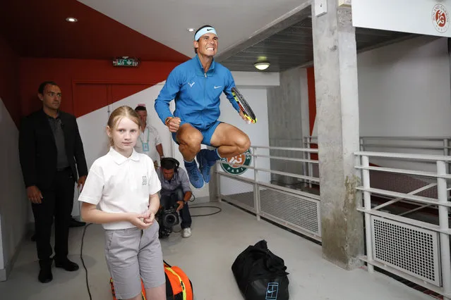 Spain's Rafael Nadal jumps in a corridor before his men's final match of the French Open tennis tournament against Austria's Dominic Thiem at the Roland Garros stadium, Sunday, June 10, 2018 in Paris. (Photo by Christophe Ena/AP Photo)