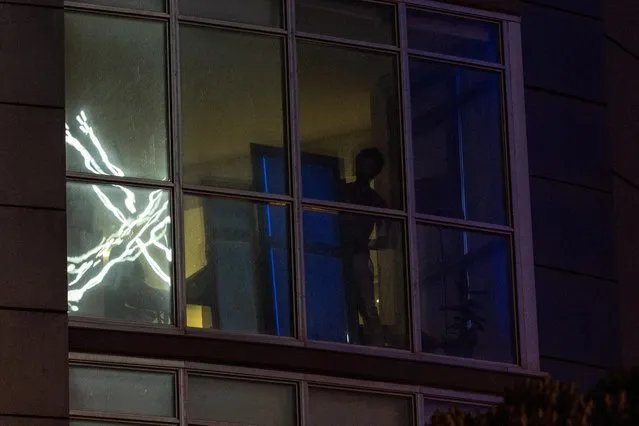 “X” logo is seen reflected on an apartment window across the street from the headquarters of the messaging platform X, formerly known as Twitter, in downtown San Francisco, California, U.S., July 30, 2023. (Photo by Carlos Barria/Reuters)
