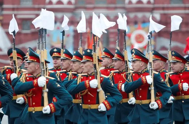 Russian service members march during a military parade on Victory Day, which marks the 76th anniversary of the victory over Nazi Germany in World War Two, in Red Square in central Moscow, Russia on May 9, 2021. (Photo by Maxim Shemetov/Reuters)