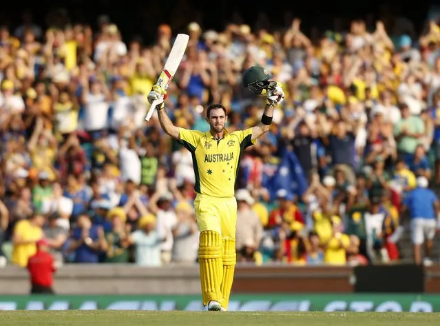 Australia's Glenn Maxwell celebrates reaching his century during their Cricket World Cup match against Sri Lanka in Sydney, March 8, 2015.  REUTERS/Jason Reed (AUSTRALIA - Tags: SPORT CRICKET TPX IMAGES OF THE DAY)