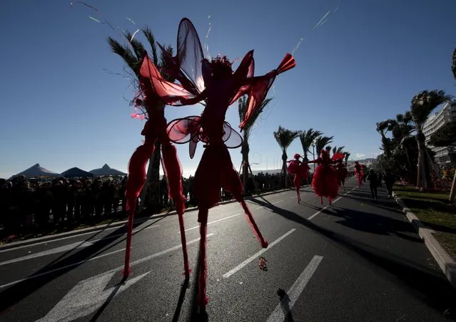 Artists perform during the flower parade as part of the carnival in Nice, France, February 13, 2016. (Photo by Eric Gaillard/Reuters)