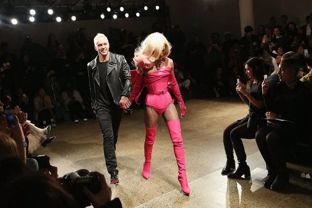 Designers David Blond (L) and Phillipe Blond walk the runway at The Blonds fashion show during Fall 2016 MADE Fashion Week at Milk Studios on February 17, 2016 in New York City. (Photo by Monica Schipper/Getty Images)