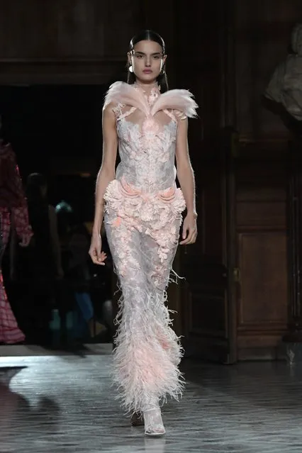 A model walks the runway during the Givenchy Menswear Fall/Winter 2017-2018 show as part of Paris Fashion Week on January 20, 2017 in Paris, France. (Photo by Dominique Charriau/Getty Images)