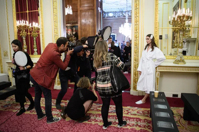 A model poses for photographers before the Julien Macdonald show during London Fashion Week on February 20, 2017 in London, England. (Photo by Leon Neal/Getty Images)