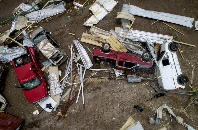 Vehicles are tossed around at McCourt & Sons Equipment Inc. after a tornado tore through the area in La Grange, Texas, on Friday May 3, 2019. (Photo by Jay Janner/Austin American-Statesman via AP Photo)