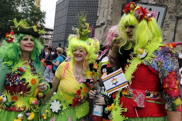 People participate in the annual Christopher Street Day parade on Kurfuerstendamm in Berlin, Germany, June 27, 2015. (Photo by Fabrizio Bensch/Reuters)
