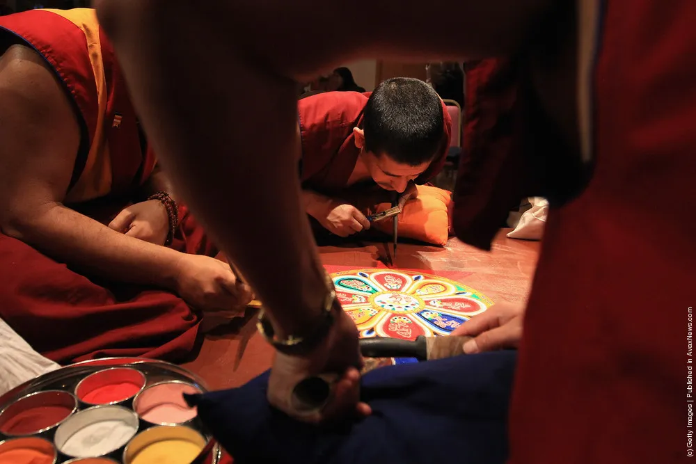 Tibetan Monks From The Panchen Lama's Monastery Create A Sand Mandala Artwork
