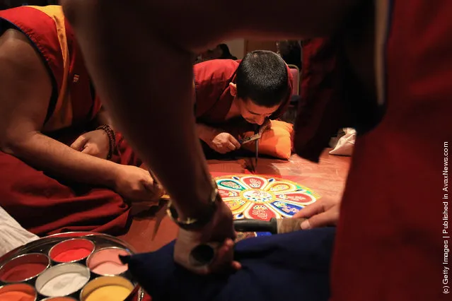 Tibetan Monks From The Panchen Lama's Monastery Create A Sand Mandala Artwork