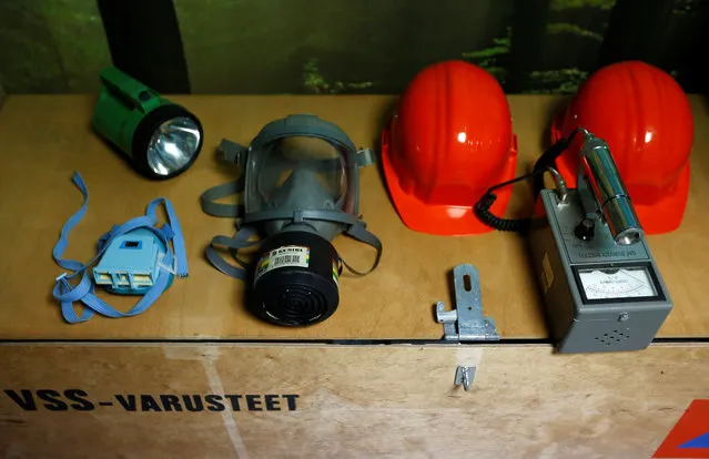 A gas mask, a Geiger counter and emergency goods are seen in Shelter Co.'s nuclear shelter model room in Osaka, Japan on April 26, 2017. (Photo by Kim Kyung-Hoon/Reuters)