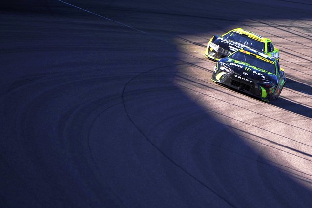 Tyler Reddick, right, and Ryan Blaney race during a NASCAR Cup Series Championship auto race at Phoenix Raceway, Sunday, November 10, 2024, in Avondale, Ariz. (Photo by John Locher/AP Photo)