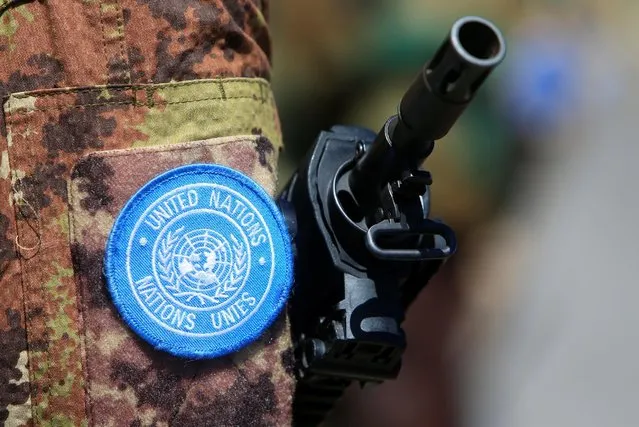 The weapon of a peacekeeper of the United Nations Interim Force in Lebanon (UNIFIL) is pictured during a handover ceremony from Italian Major-General Luciano Portolano to Irish Major-General Michael Bearyover the command of Lebanon's U.N. peacekeeping forces at the United Nations headquarters in Naqoura, southern Lebanon, July 19, 2016. (Photo by Ali Hashisho/Reuters)