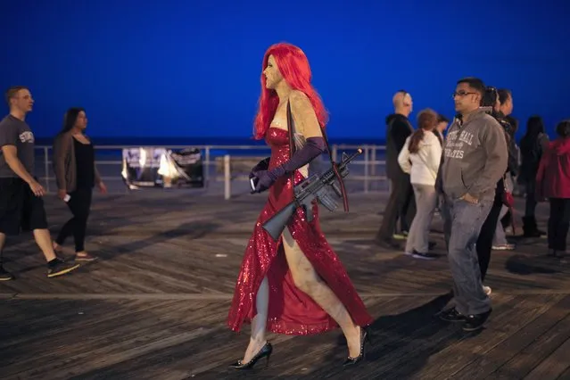 A reveller takes part in a Zombie Walk in Asbury Park, New Jersey October 4, 2014. (Photo by Eduardo Munoz/Reuters)