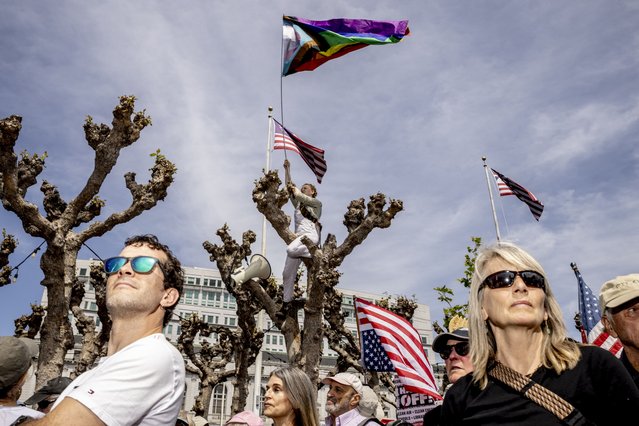Demonstrators rally in Civic Center Plaza in San Francisco, on Saturday, April 5, 2025, during a protest against President Donald Trump, part of the “Hands Off” rallies held nationwide. (Photo by Stephen Lam/San Francisco Chronicle via AP Photo)