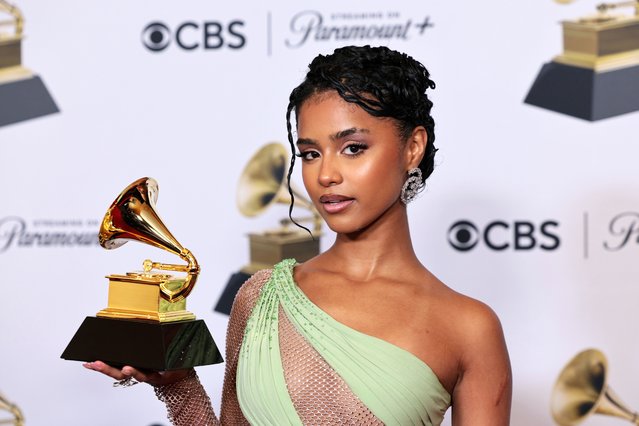 South African singer Tyla, winner of the “Best African Music Performance” award for “Water”, poses in the press room during the 66th annual Grammy Awards ceremony at Crypto.com Arena in Los Angeles, California, USA, 04 February 2024. (Photo by Allison Dinner/EPA)