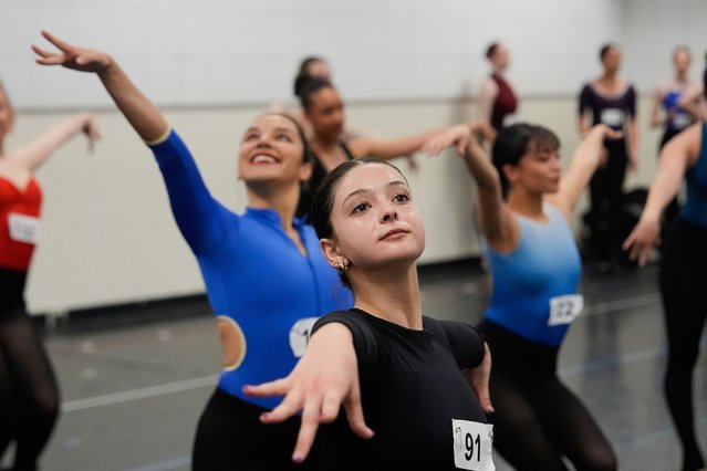 Dancers rehearse choreography before an audition for the Radio City Rockettes at Radio City Music Hall, Tuesday, April 22, 2025, in New York. (Photo by Julia Demaree Nikhinson/AP Photo)