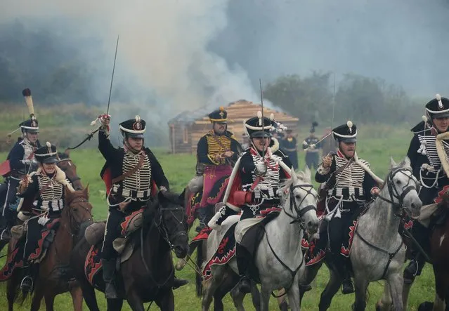 Participants in the Borodino Battle re-enactment during the show at the Borodino Field in the Moscow Region on September 4, 2016. (Photo by Kirill Kallinikov/Sputnik)