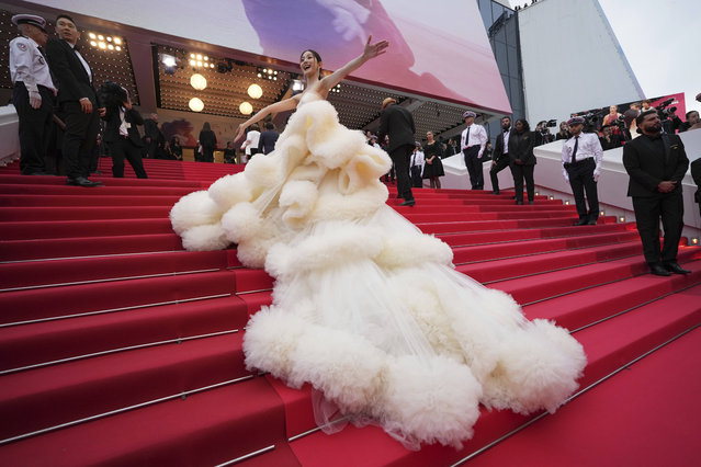 Chinese actress Wan QianHui poses for photographers during the opening ceremony red carpet of the 78th international film festival, Cannes, southern France, Tuesday, May 13, 2025. (Photo by Natacha Pisarenko/AP Photo)