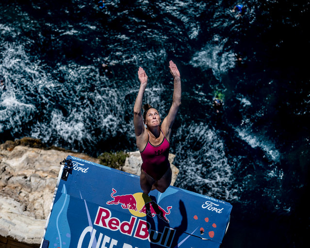 In this handout image provided by Red Bull, Ginni van Katwijk of The Netherlands dives from the 22 metre platform during the first competition day of the second stop of the Red Bull Cliff Diving World Series on June 28, 2025 at Polignano a Mare, Italy. (Photo by Dean Treml/Red Bull via Getty Images)