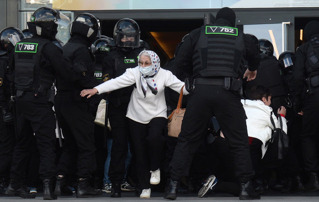Belarus policemen detain participants during a rally to protest against the presidential election results in Minsk, Belarus, 13 September 2020. Opposition activists continue their every day protest actions, demanding new elections under international observation. (Photo by EPA/EFE/Stringer)