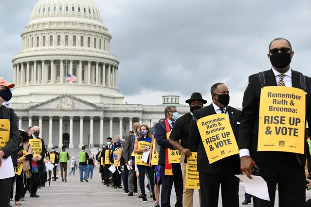 Religious leaders stand outside the U.S. Capitol to protest the Senate's actions related to the Supreme Court, police reform and immigration, in Washington, U.S., September 29, 2020. (Photo by Erin Scott/Reuters)