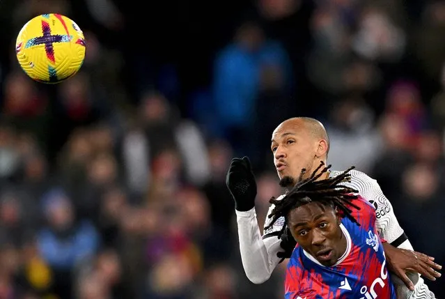 Liverpool's Brazilian midfielder Fabinho (L) vies with Crystal Palace's English midfielder Eberechi Eze during the English Premier League football match between Crystal Palace and Liverpool at Selhurst Park in south London on February 25, 2023. (Photo by Glyn Kirk/AFP Photo)