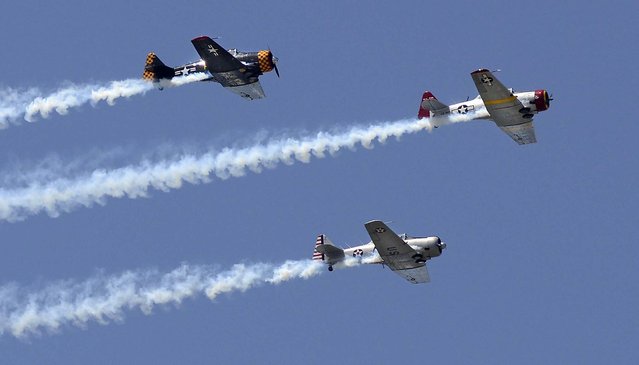 World War II era planes fly in the skies over Northwest Florida during the Parade of Heroes in Fort Walton Beach, on April 20, 2013. (Photo by Nick Tomecek/Northwest Florida Daily News)