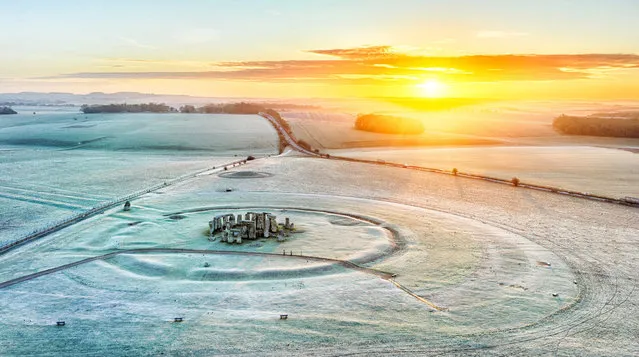 Dawn breaks over a frosty Stonehenge in Wiltshire this morning, February 6, 2023. The week ahead is due to see colder weather. Rural areas will possibly see –7°C overnight tonight. (Photo by Chris Gorman/Big Ladder)