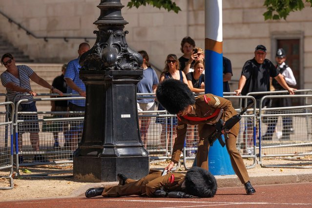 A cavalry guard passes out during a procession rehearsal on the Mall for a state visit of the Emperor and Empress of Japan on June 24, 2024 in London, England. The Emperor and Empress of Japan are on a three-day state visit to the United Kingdom hosted by King Charles III. The Met Office reports that temperatures could reach the low 30s in parts of the UK this week, peaking on Wednesday or Thursday. (Photo by Dan Kitwood/Getty Images)